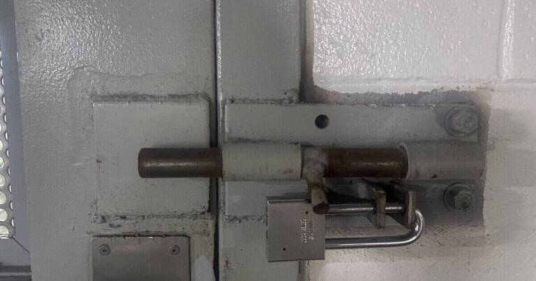 Bolted In: Georgia Prisons Lock the Fire Exits, and the State's Own Inspectors Keep Finding Them Locked